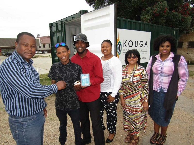 LED Portfolio Councillor Bryan Dhludhlu (left) hands over the container keys to Young Generation members Ilgin Grobbelaar and Bernard Draai while SMME officer Zingi Mdidimba, LED director Carleen Arends and LED manager Vivian Blouw look on.