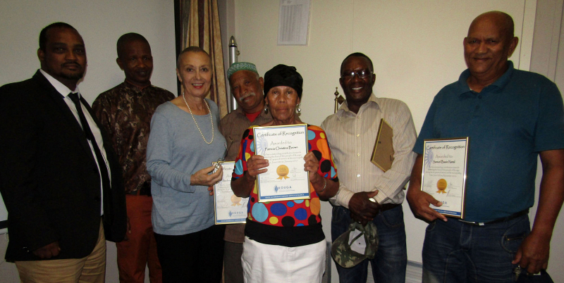 Speaker Horatio Hendricks, Municipal Manager Sidney Fadi and Mayor Elza van Lingen thank Andrew Gasebo, Christina Brown, Piet Dondashe and Sam Natal on their long and outstanding service to the municipality.